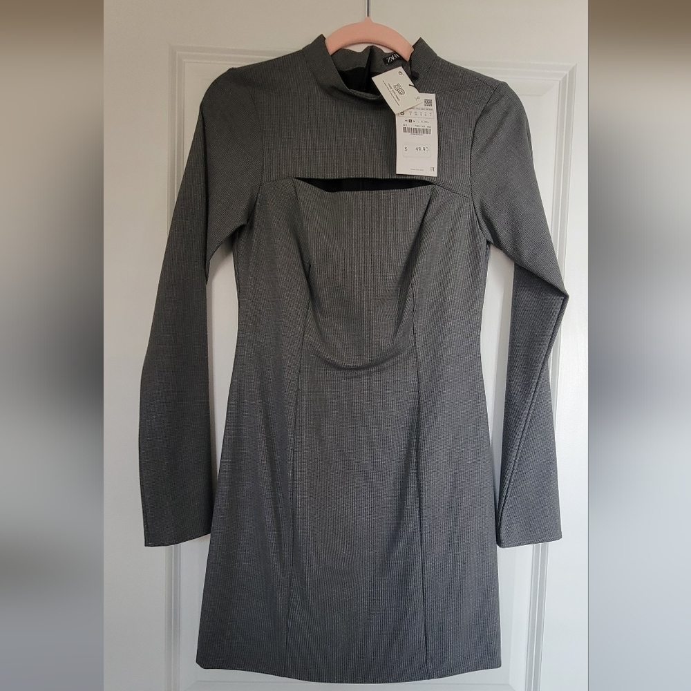 Brand new, long sleeve dress.